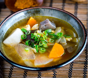 Originally created as a Buddhist temple cuisine, Kenchinjiru  is a clear soup cooked with root vegetables, tofu, shiitake and kombu stock