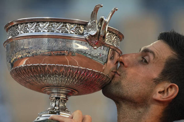 Djokovic claims 19th Slam with 5-set comeback at French Open
