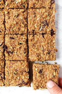 These healthy zucchini breakfast bars are the ultimate morning treat! Made with oats, quinoa, banana, and zucchini, they're healthy, vegan & gluten-free!