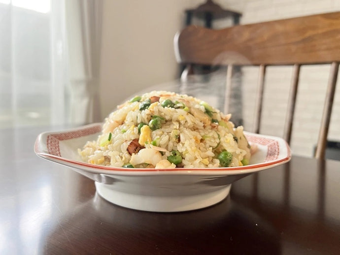 We trick an online scammer into teaching us how to cook the best fried rice we’ve ever made