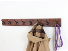 Try solid cherry wall mounted coat rack with oil rubbed bronze wall coat hooks 4 5 utra wide rail made in the usa mahogany 52 x 4 5 ultra wide with 10 hooks